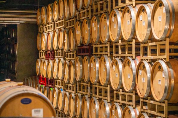 Photo by Mark Stebnicki httpswww.pexels.comphotostack-of-barrels-with-wine-in-wine-cellar-17765439